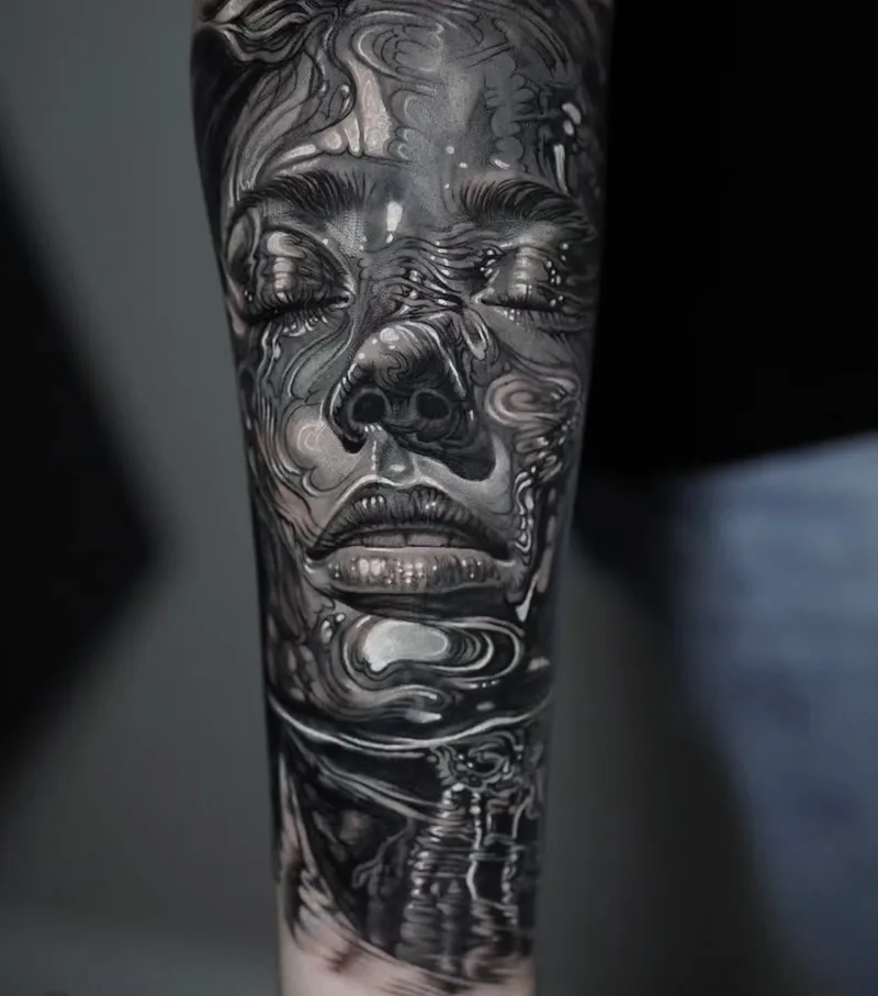 Black and grey surreal portrait tattoo by Stefano Alcántara